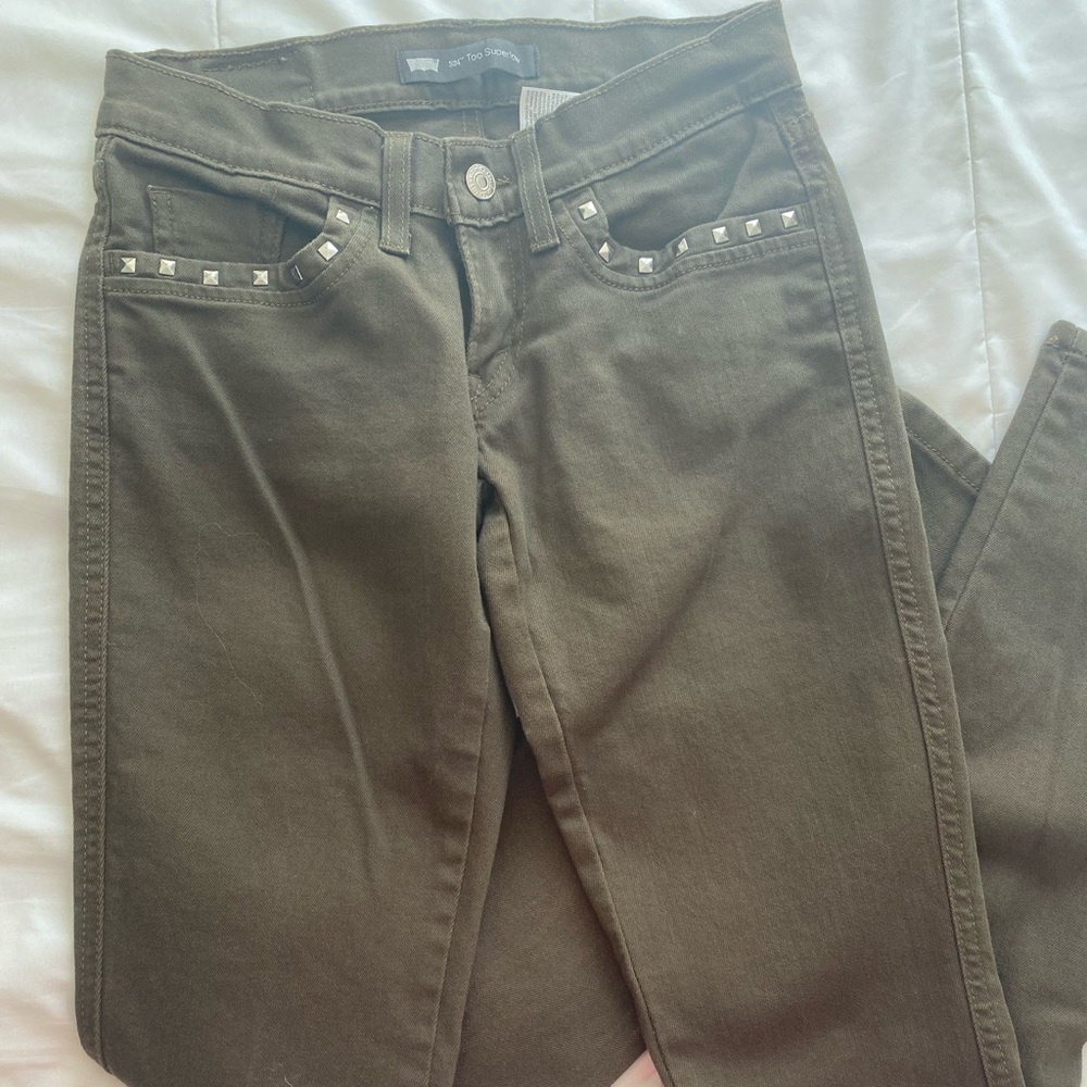 Army green studded Levi jeans. Size 0.